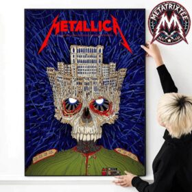 A person hanging a framed Metallica Bucharest 2026 poster canvas on a wall, showcasing a detailed skull artwork blended with the Palace of the Parliament architecture against a dark blue textured background.