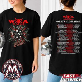 A woman wearing the front and back of the Wacken Open Air 2026 Warm-Up Shows Tee, a black t-shirt featuring a red bull skull logo and a list of world tour dates.