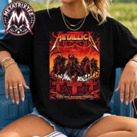 Woman wearing a black Metallica Bucharest pop-up T-shirt featuring a fiery red and orange graphic poster by Maxx242 depicting the Four Horsemen riding above tombstones.