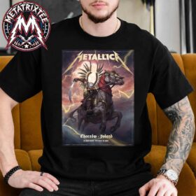 Man wearing a black Metallica Chorzow pop-up T-shirt featuring a detailed poster artwork by Jakub Jagado depicting a skeleton winged hussar riding a horse amidst lightning.