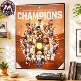 Texas Longhorns Softball team celebrating their victory on a 2026 Women's College World Series NCAA National Champions poster canvas displayed on a wall.