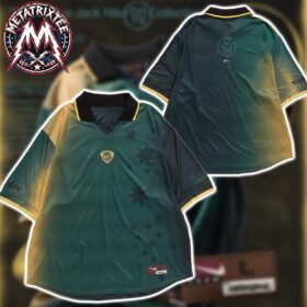 Front and back views of a green and gold Australia Cactus Jack jersey with a black collar and Southern Cross stars.
