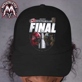 A close-up of a person wearing the Congrats Carolina Hurricanes Vs Vegas Golden Knights 2026 Stanley Cup Final Matchup Black Classic Cap Snapback Hat.jpg, featuring the 2026 Stanley Cup Final logo, the championship trophy, and the goalie helmets of both teams printed on the front.