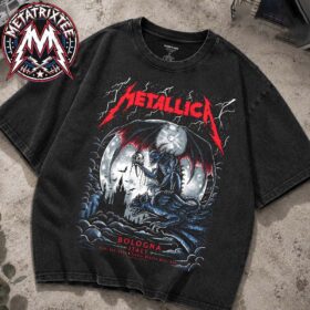 A flat lay view of the Pop-Up M72 Bologna Poster By Keith Stanley Shop Metallica On June 3rd 2026 At Stadio Renato Dall'Ara In Bologna Italy Washed T-Shirt, displaying a faded black fabric with a vivid graphic of a horned demon holding a skull beneath the red Metallica logo.