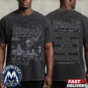 man wearing a washed black aftershock festival t-shirt with distressed graphic prints on the front and back.