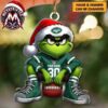 NFL Miami Dolphins Grinch In Santa Hat Sitting On Football Custom Name Number XMAS 2026 Holiday Ornament NFL Miami Dolphins Grinch In Santa Hat Sitting On Football Custom Name Number XMAS 2026 Holiday Ornament